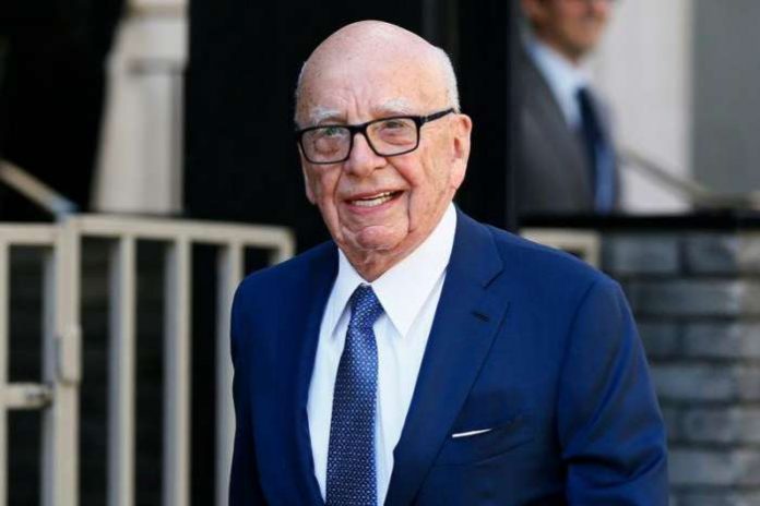 FILE PHOTO - Media mogul Rupert Murdoch leaves his home in London, Britain March 4, 2016. Murdoch wed former supermodel Jerry Hall in a low-key ceremony in central London on Friday, the fourth marriage for the media mogul. REUTERS-Stefan Wermuth