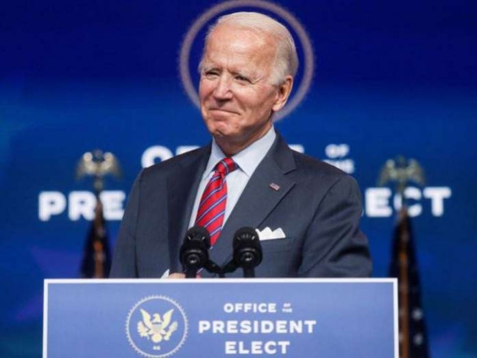 FILE PHOTO - U.S. President-elect Joe Biden speaks about the economy and the final U.S. jobs report of 2020 at his transition headquarters in Wilmington, Delaware, U.S., December 4, 2020. REUTERS-Leah Millis-File Photo