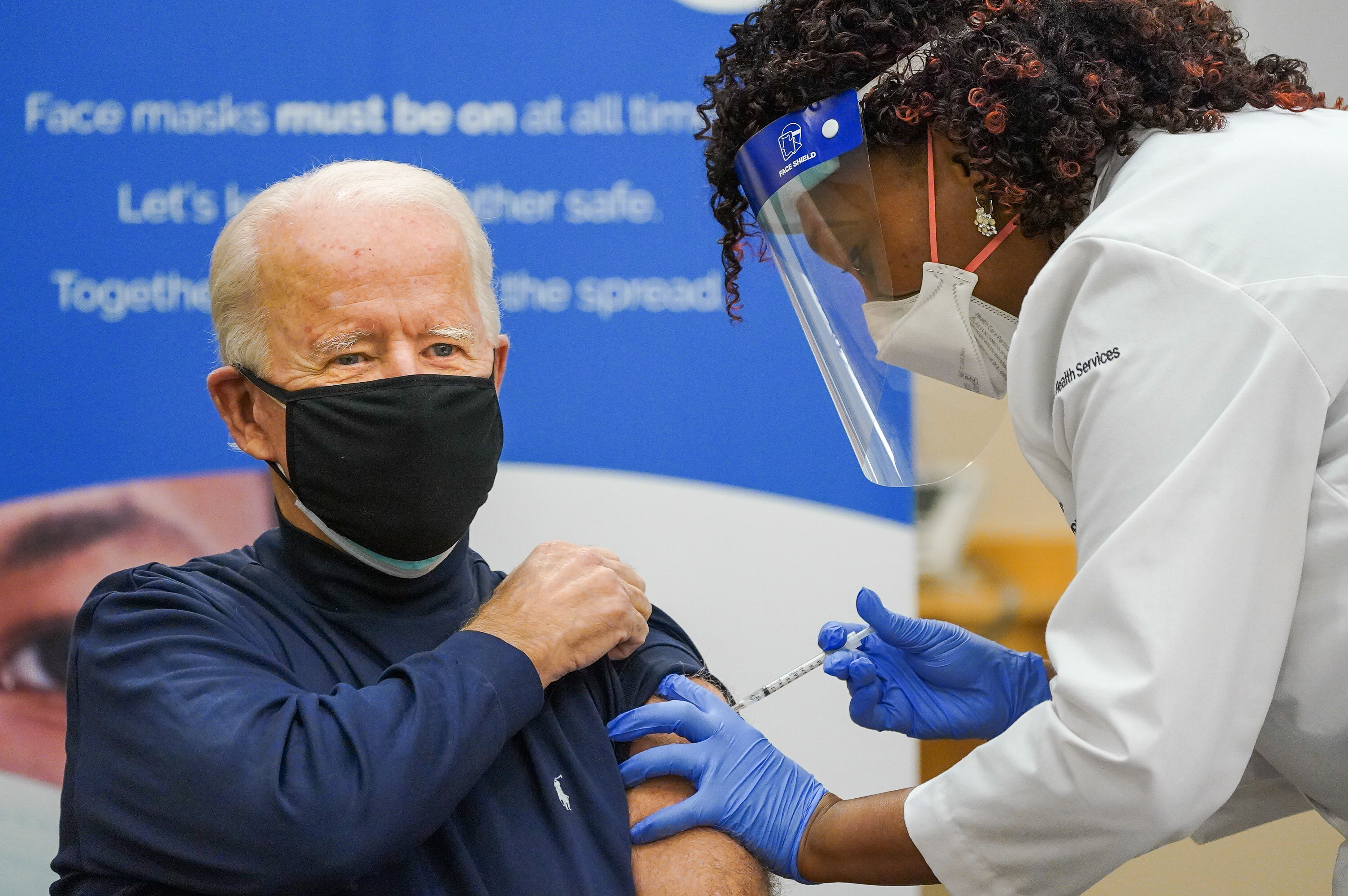 Joe Biden takes covid-19 vaccine live on television