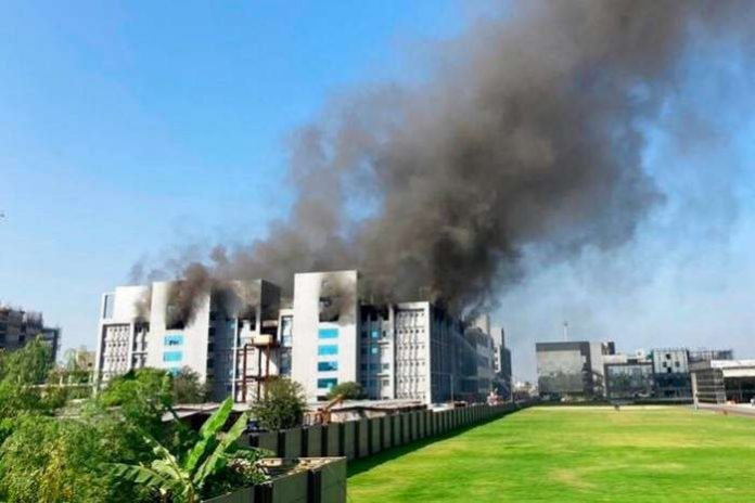 Smoke rises from the Serum Institute of India, the world's largest vaccine maker that is manufacturing the AstraZeneca-Oxford University vaccine for the coronavirus, in Pune, India, Thursday, Jan. 21, 2021. AP - Rafiq Maqbool Smoke rises from the Serum Institute of India, the world's largest vaccine maker that is manufacturing the AstraZeneca-Oxford University vaccine for the coronavirus, in Pune, India, Thursday, Jan. 21, 2021. AP - Rafiq Maqbool