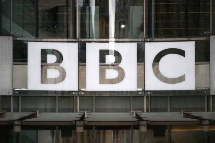 FILE PHOTO: A BBC sign is displayed outside Broadcasting House in London, Britain July 19, 2017.
