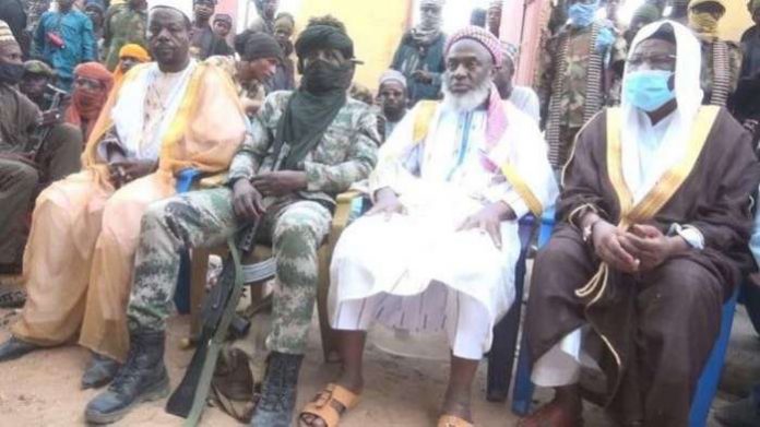 Sheikh Ahmad Gumi (second from right) recently met with bandits in Zamfara to negotiate peace.