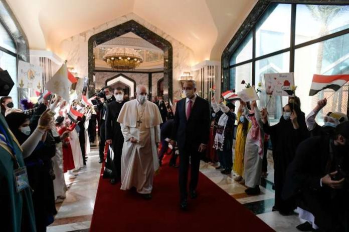 Iraqi Prime Minister Mustafa Al-Kadhimi walks with Pope Francis upon his arrival at Baghdad International Airport, in Baghdad, Iraq March 5, 2021. Vatican Media-Handout via REUTERS Iraqi Prime Minister Mustafa Al-Kadhimi walks with Pope Francis upon his arrival at Baghdad International Airport, in Baghdad, Iraq March 5, 2021. Vatican Media-Handout via REUTERS