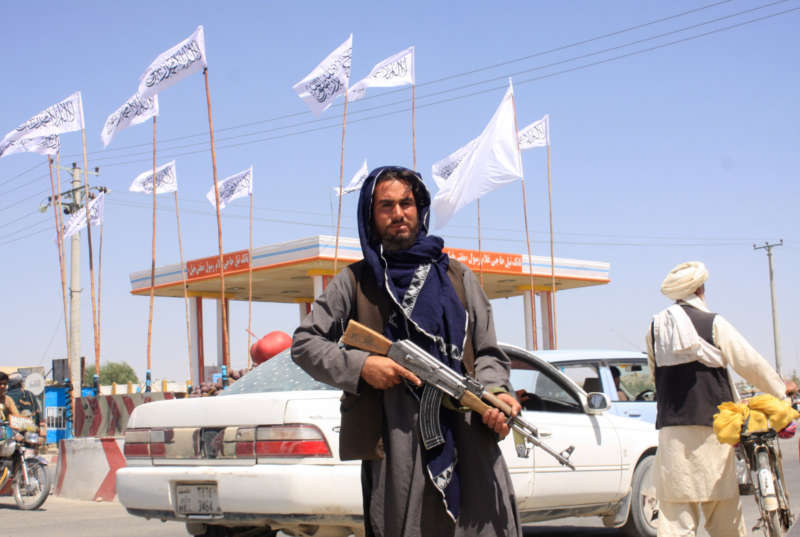 A Taliban fighter looks on as he stands at the city of Ghazni, Afghanistan August 14, 2021. REUTERS/Stringer NO RESALES. NO ARCHIVES