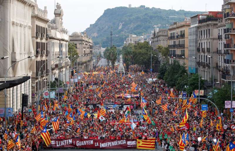 People hold up Esteladas (Catalan separatist flag) during the National Day Catalonia, called 'La Diada', in Barcelona, Spain, September 11, 2021. REUTERS-Albert Gea