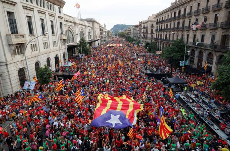 People hold up Esteladas (Catalan separatist flag) during the National Day Catalonia, called 'La Diada', in Barcelona, Spain, September 11, 2021. REUTERS-Albert Gea