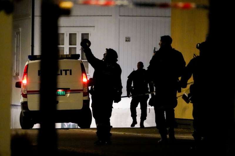 Police officers investigate after several people were killed and others were injured by a man using a bow and arrows to carry out attacks, in Kongsberg, Norway, October 13, 2021. Hakon Mosvold-NTB-via REUTERS