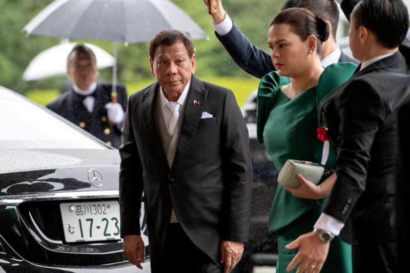 Philippines President Rodrigo Duterte arrives with daughter Sara Duterte-Carpio to attend the enthronement ceremony of Japan's Emperor Naruhito in Tokyo, Japan October 22, 2019. Carl Court-Pool via REUTERS-File Photo