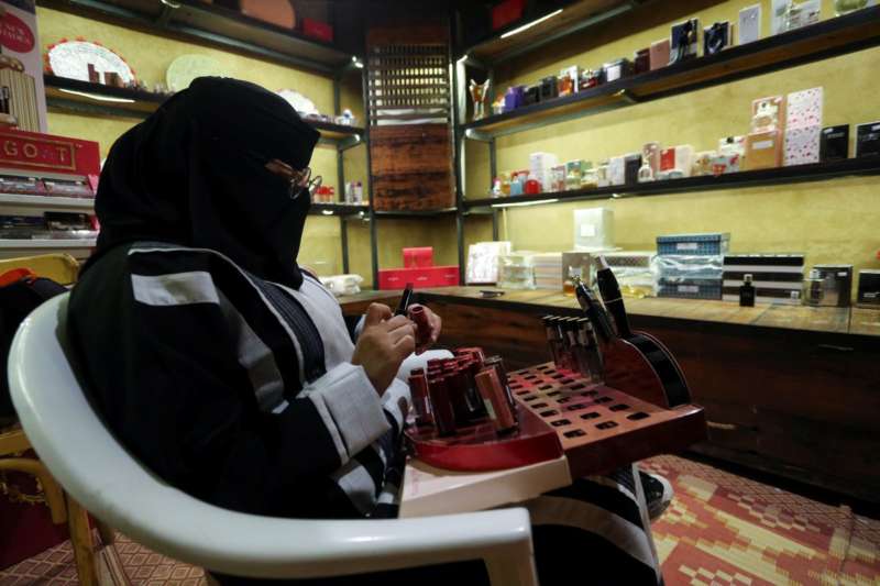Saudi woman Mada'in al-Balawi works in a cosmetic shop in the old town, in AlUla, Saudi Arabia October 31, 2021. REUTERS-Ahmed Yosri