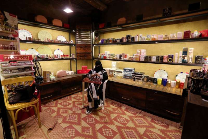 Saudi woman Mada'in al-Balawi works at a cosmetic shop in the old town, in AlUla, Saudi Arabia October 31, 2021. REUTERS-Ahmed Yosri