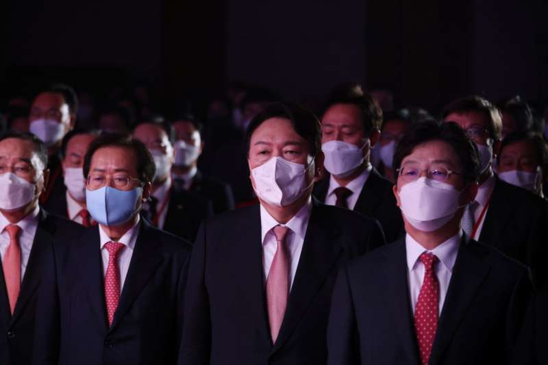 South Korea's main opposition People Power Party's contender for next year's presidential election former Prosecutor General Yoon Seok-Youl, lawmaker Hong Joon-pyo and former lawmaker Yoo Seong-min attend the final race to nominate their presidential election candidate, in Seoul, South Korea, November 5, 2021. REUTERS/Kim Hong-Ji/Pool
