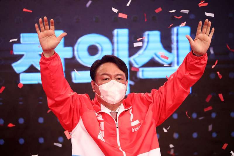 South Korea's main opposition People Power Party's contender for next year's presidential election, former Prosecutor General Yoon Seok-Youl, waves after being nominated as presidential election candidate, in Seoul, South Korea, November 5, 2021. REUTERS/Kim Hong-Ji/Pool